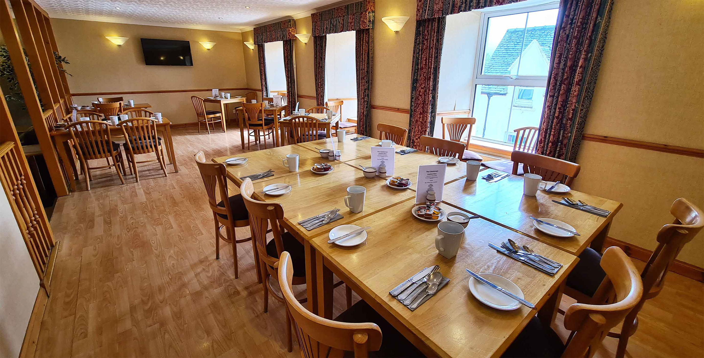 Inclusive full cooked Scottish breakfast is available at The Caledonian in Portree Dining room Hotel Portree